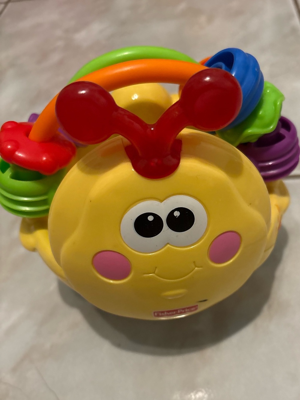 Fisher-Price Yellow Smile Bee Activity Rattle with Multicolor Rings